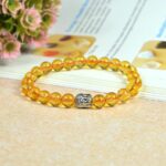 Citrine bracelet with buddha charm