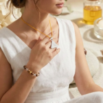 Maa Saraswati Yantra Silver Locket and Wood & Clear Crystal Bracelet Combo